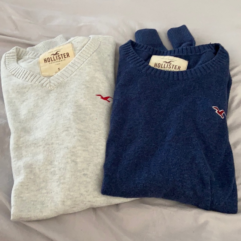 2 Hollister sweaters.